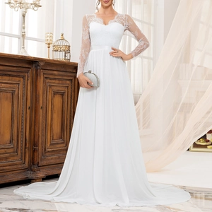Close-up of white bridal gown featuring intricate floral lace sleeves and silk waist belt