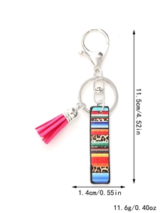 Detail view of rainbow and leopard print keychain with pink tassel and size dimensions