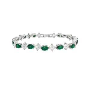 Elegantes silberfarbenes Armband mit grünen ovalen und klaren blütenförmigen Zirkonia-Steinen