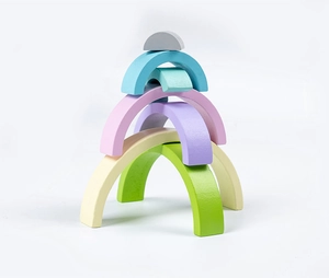 Macro detail of stacked colorful wooden rainbow blocks for kids early education toys