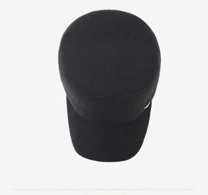 Overhead view of a black wool cadet cap for men with a metallic side logo detail