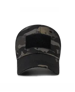 Front view of camouflage tactical cap with velcro patch area and curved brim