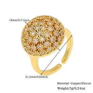 Detail view of gold open ring with 18mm zircon hemisphere and copper material specs