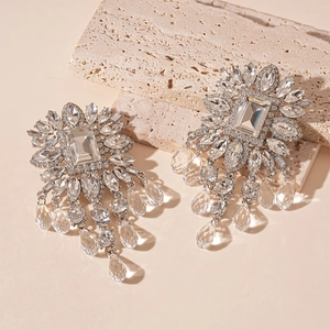 Luxury rhinestone tassel earrings with silver metal base and crystal flower accents