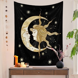 Detail of celestial moon and sun wall tapestry in a cozy living room setting