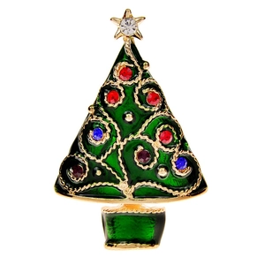 Detailed view of Christmas tree brooch with green enamel and colorful rhinestones