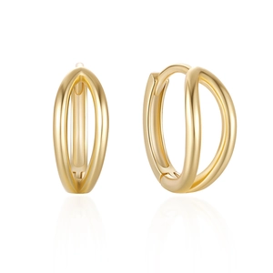 Detailed close-up of golden double hoop earrings with polished surface and reflective finish