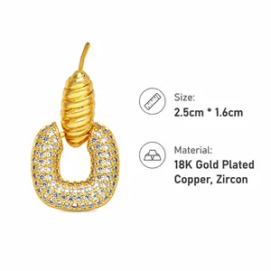Detail view of 18K gold plated triangle earrings with size specifications 2.5cm x 1.6cm