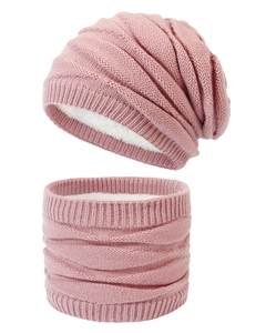 Close-up of knit winter beanie and neck warmer set with thick white fleece lining