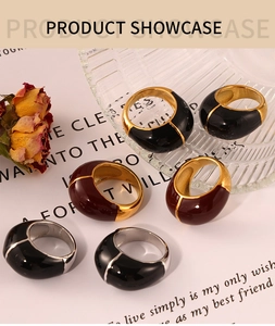 Detail shot of vintage geometric enamel gold-plated rings in black and dark red colors