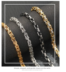 Detail showing Byzantine style bracelets in gold, silver, and black woven steel finishes