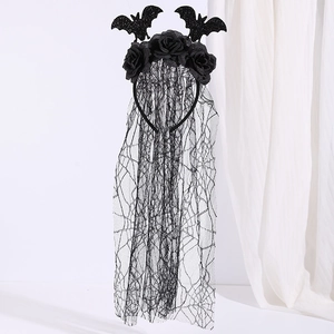 Detail of Halloween headband with black roses, bat wings and long spider web lace veil