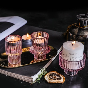 Pink ribbed glass candle holder set for elegant Nordic style dinner table decor