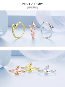 Macro detail of S925 sterling silver hug rings in gold, rose gold and silver finishes