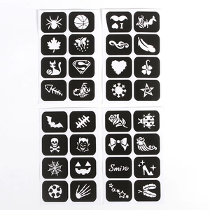 Detailed view of Halloween body paint stencils with spider, bat, and pumpkin patterns
