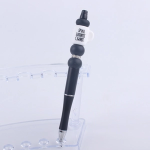 Detail of DIY beadable pen with Small Business Owner coffee cup silicone bead
