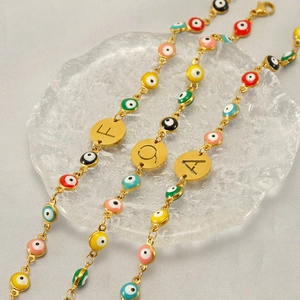 18K gold plated stainless steel evil eye bracelets with personalized initials A, F, O