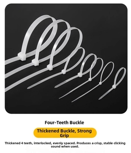 Detail of white nylon zip ties with 4-tooth locking head for heavy duty fastening
