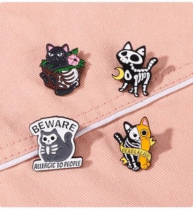 Set of 4 Halloween skeleton cat enamel pins with Beware Allergic to People text detail