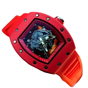 Unisex skeleton sports watch with red tonneau case and silicone strap on white background