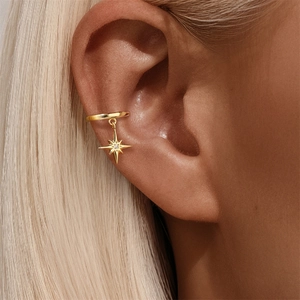 Close-up of a gold-plated S925 silver ear cuff with a sparkling star pendant