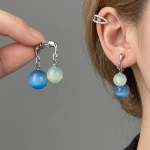 Elegant cat eye bead drop earrings with blue tassels and silver hooks for women