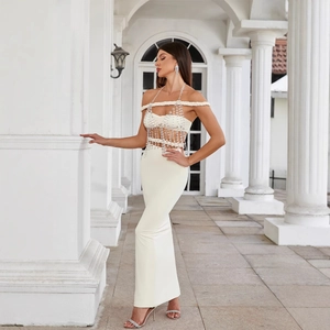 Elegant ivory off-shoulder beaded two-piece maxi set with rhinestones and mermaid skirt