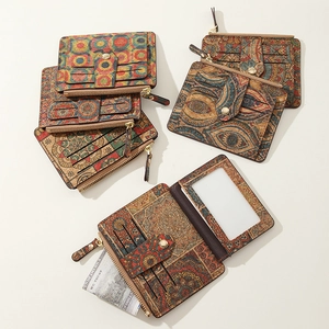 Detail view of cork wallet with bohemian mandala prints showing card slots and ID window