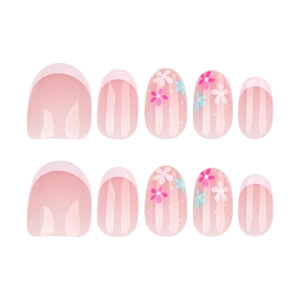 Short round press-on nails in rose pink with floral designs and French tips