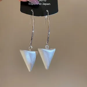 Minimalist 18k brushed metal triangle drop earrings with white mother-of-pearl accents