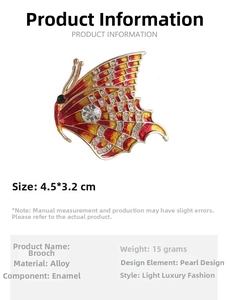 Detail showing dimensions 4.5x3.2cm of the crystal butterfly brooch with red enamel