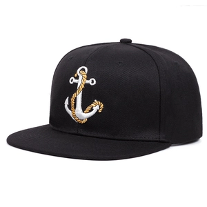 Black snapback baseball cap featuring a detailed white anchor and yellow rope embroidery