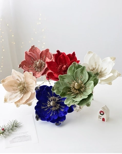 Close-up of 25cm velvet artificial magnolia flower with glitter edges for Christmas tree