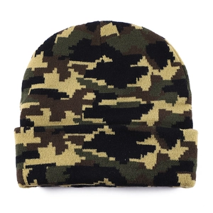 Macro detail of military digital camouflage knit texture on warm winter beanie hat