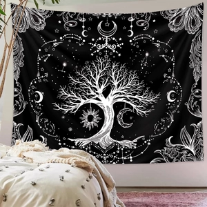 Close-up detail of the black and white Tree of Life tapestry with sun and moon designs