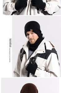 Close-up of black winter knitted hat and neck warmer set with warm fleece lining texture