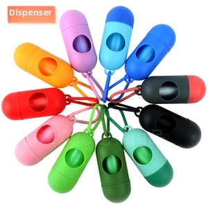Detail of capsule-shaped pet waste bag dispensers with portable hooks in 12 colors