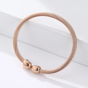 Rose gold magnetic therapy titanium steel twisted wire cable bangle for men and women