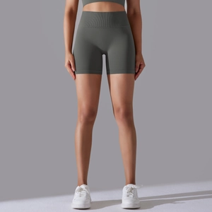 Detailed view of seamless high-waist ribbed yoga shorts in dark greyish green finish