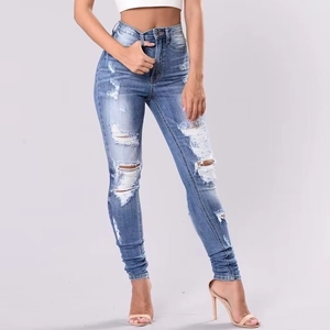 Jean skinny taille haute pour femme en denim délavé bleu clair avec déchirures stylées