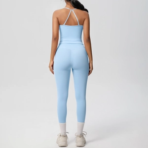 Back view of light blue high-waist yoga set with racerback top and seamless leggings