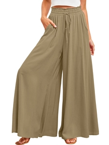 Détail du pantalon large kaki à taille haute avec cordon élastique et poches latérales