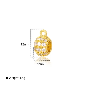 Macro shot of 12mm gold plated bead with cubic zirconia stones for DIY jewelry making