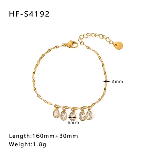 Detail showing 2mm gold chain with 5mm round butterfly pendant and adjustable clasp