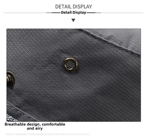 Detail of grid fabric texture and metal ventilation eyelet on the outdoor hat