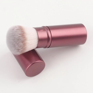 Portable retractable mushroom kabuki brush for blush and powder in metallic burgundy