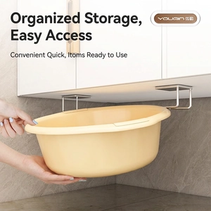 No-drill stainless steel wall hooks holding a washbasin in a clean bathroom setting