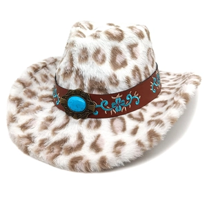 Macro shot of faux fur leopard print cowboy hat with turquoise and floral embroidery