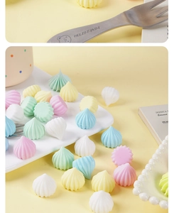 Macro detail of colorful spiral meringue resin charms for DIY craft and phone case decor