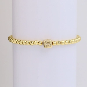 18k gold cube initial A beaded elastic bracelet with sparkling zircon stones